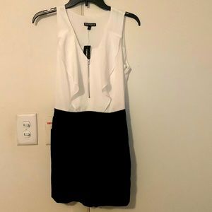 Black and white ruffle zip front romper